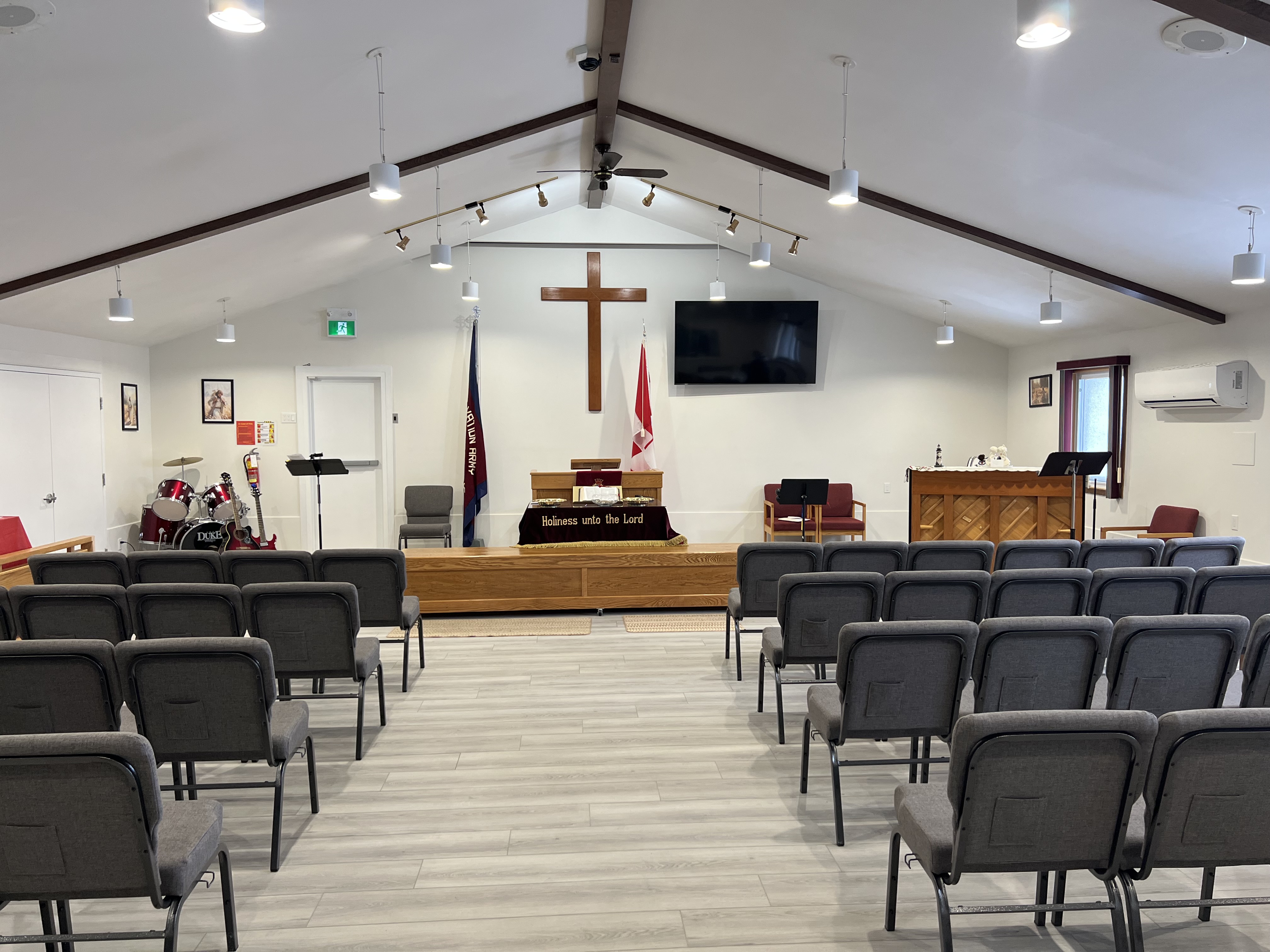 A photo of the new Sanctuary. New chairs, new floor, new lighting.  